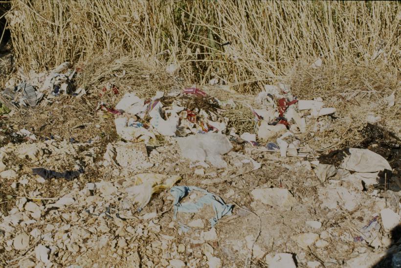 Otpad pored trske uz Zrmanju ispred 